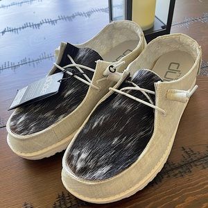 NWT’s Hey Dude custom made with cowhide. Size 9